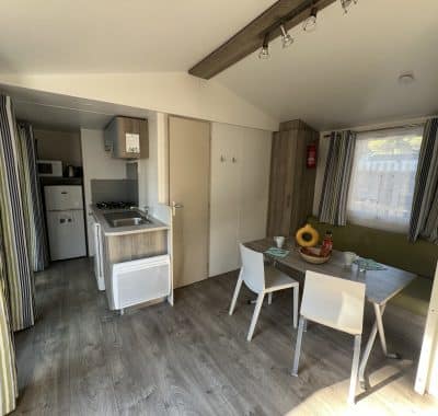 Location  GRAND CONFORT : Mobile-home, 4/6 personnes, 2 chambres, Terrasse couverte au camping Le Suroit - 1